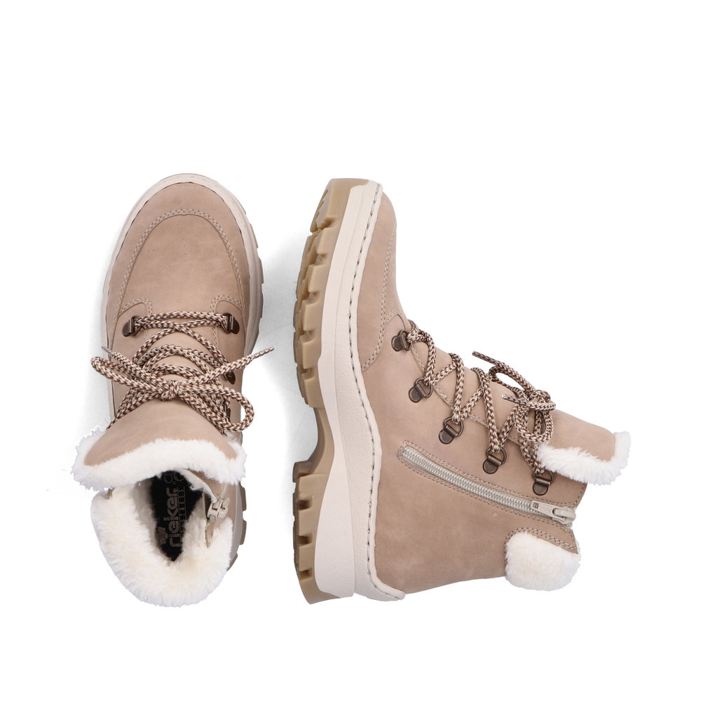 Светло-бежевые утепленные ботинки хайкеры из экокожи на утолщенной подошве Rieker